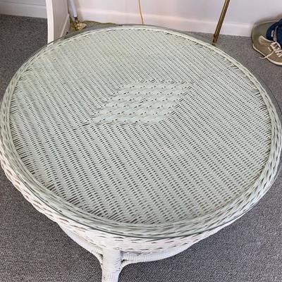 Round approx. 34" white painted wicker coffee table with heavy glass top