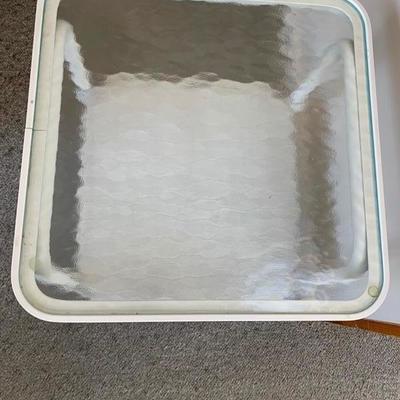 Small white wicker table with glass top