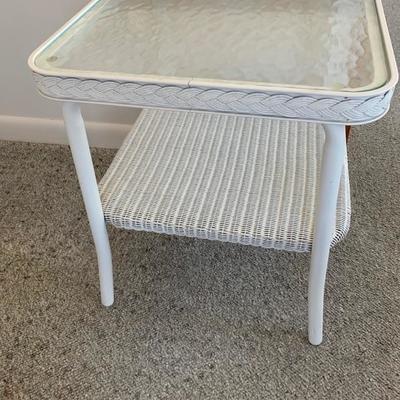 Small white wicker table with glass top