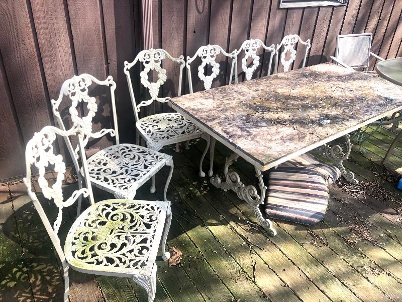 Wrought iron patio table with 6 chairs, top needs replaced