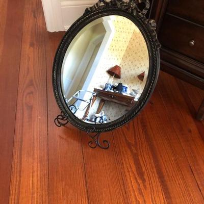 Small oval mirror
