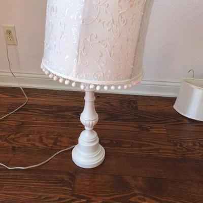 Two lamps with ball fringe