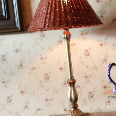 Two lamps with rattan shades