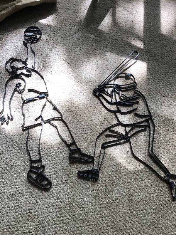 Two metal sports figurines wall decor