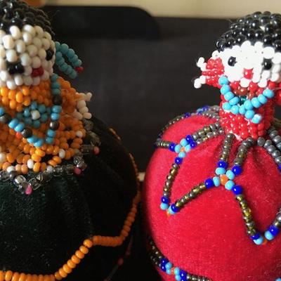 lot of Beaded Native American pincushions and a small Mexican pot. Vintage.