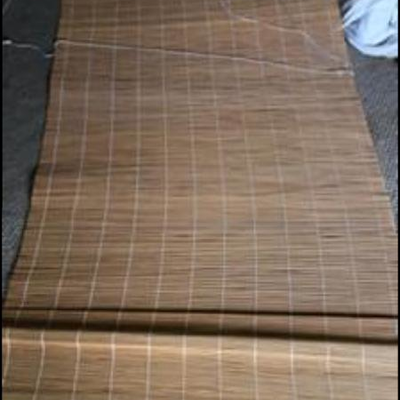 Two roll up bamboo blinds