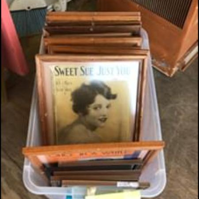 Box of old framed sheet music