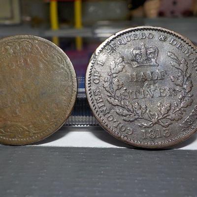 1813 King George Half Tiver and 1862 Queen Victoria coin.