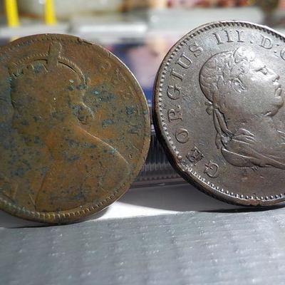 1813 King George Half Tiver and 1862 Queen Victoria coin.