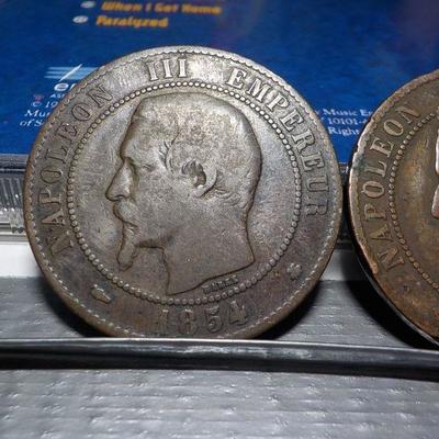 1854 and a 1862 Napoleon 111 coins