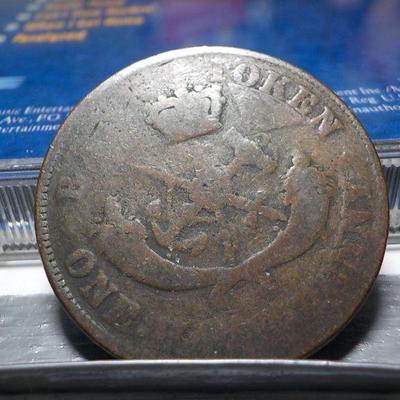 1854 Half penny Token.