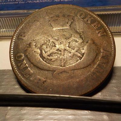 1854 Half penny Token.