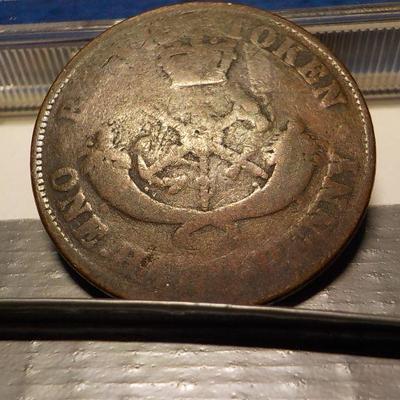 1854 Half penny Token.