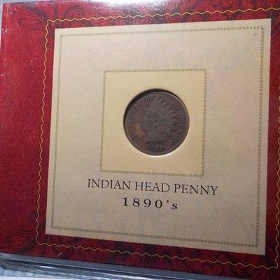 1890 Indian Head in folder holder.