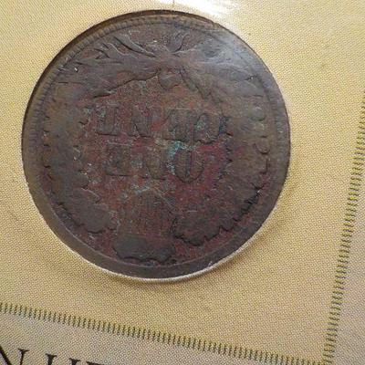 1890 Indian Head in folder holder.
