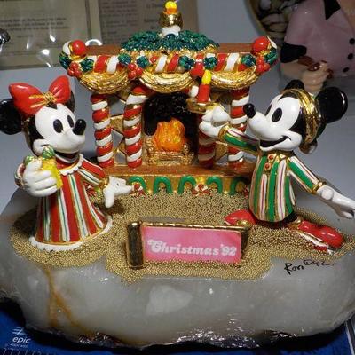 Mickey and Mini Anniversary with gold flakes.