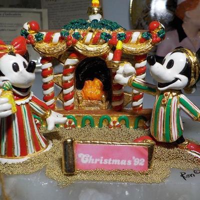 Mickey and Mini Anniversary with gold flakes.