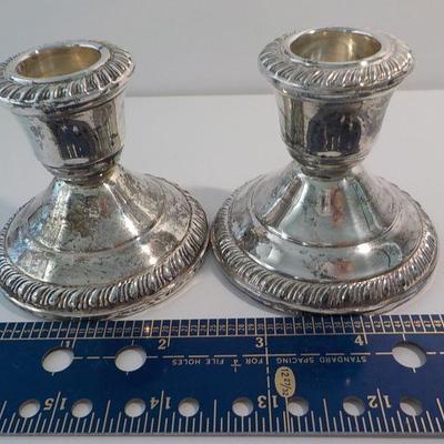 2 - sterling candle holders .