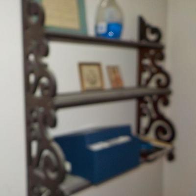 Hanging solid wood book or nic/nac shelve with articulate scroll design.