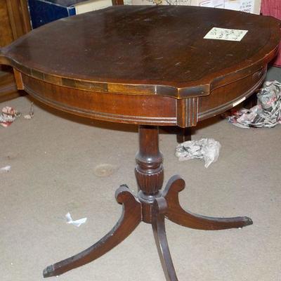 Mid Century square end table with claw feet.