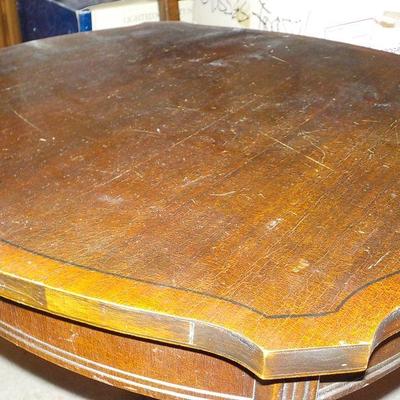 Mid Century square end table with claw feet.