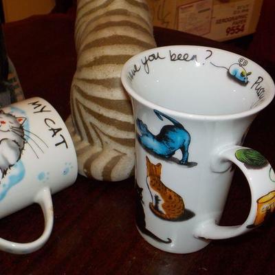 2- Wood carve cats and 2 cat mugs limited editions.