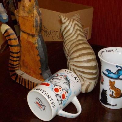 2- Wood carve cats and 2 cat mugs limited editions.