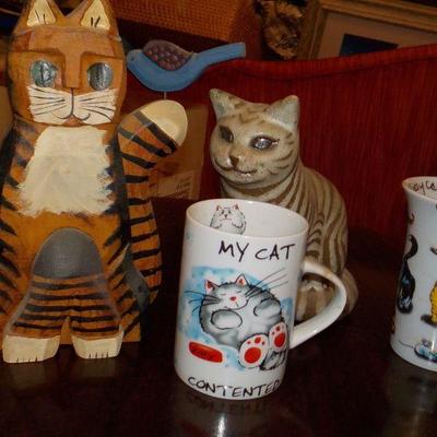 2- Wood carve cats and 2 cat mugs limited editions.
