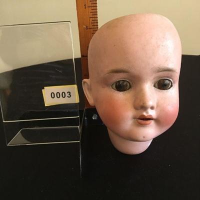 Large German Porcelain Doll Head with working eyes. Well marked.