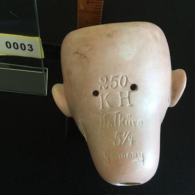 Large German Porcelain Doll Head with working eyes. Well marked.