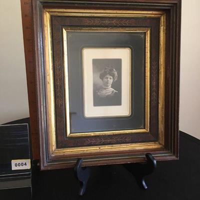 Antique photograph in Eastlake frame