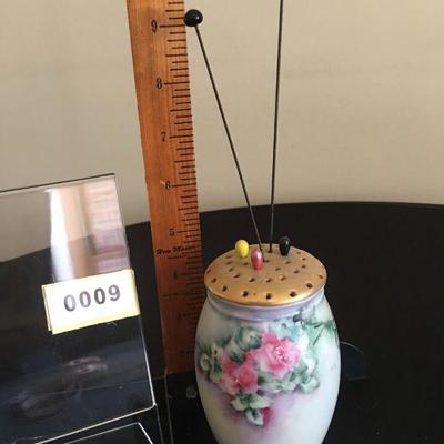Porcelain hat pin jar complete with hat pins