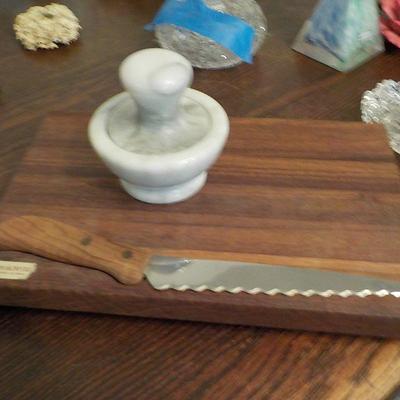 Teakwood  cutting table & knife plus mortar & pestle.