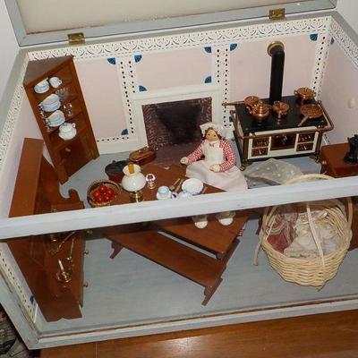 Miniature doll house with case.