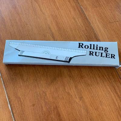 Rolling ruler in box