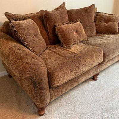 Haverty's sofa with wall decor 