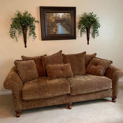 Haverty's sofa with wall decor 