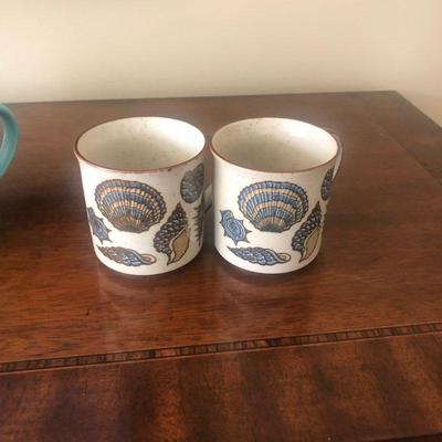 Two seashell coffee mugs