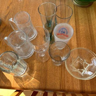 Table full of glassware , barware and other