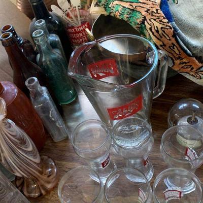 Antique bottles and draft beer set