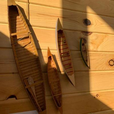 4 piece collection of Native American canoes 