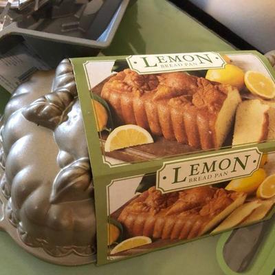 4 Pieces NEW - Lemon Cake Mold Pan, Waffle Cone Cake Pan (too cool), Starburst Mold Pan, 2-pc cutting board