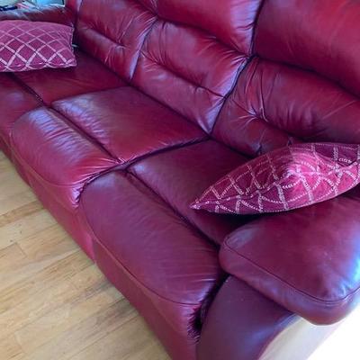 Well cared for red leather couch / recliner
