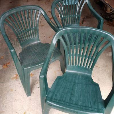 3 Green plastic chairs