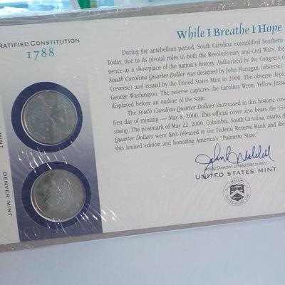 2 Sets of state quarters, non-circulated Maryland and South Carolina.