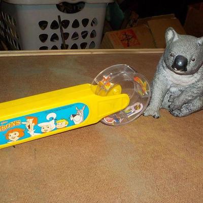 The Original "Jetsons" spin toy and a hand painted Koala Bear;