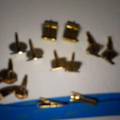 5 sets of mens cuff links and tie clasps.