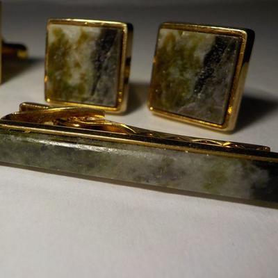 5 sets of mens cuff links and tie clasps.