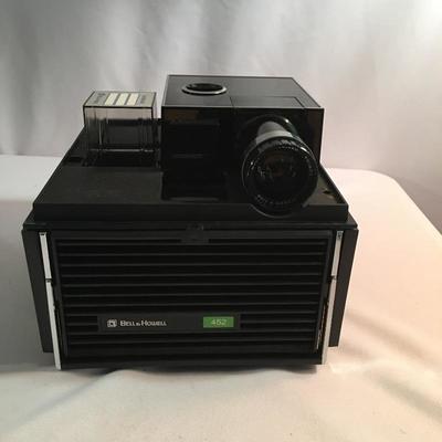 Lot 33 - Vintage 8MM Projector & More