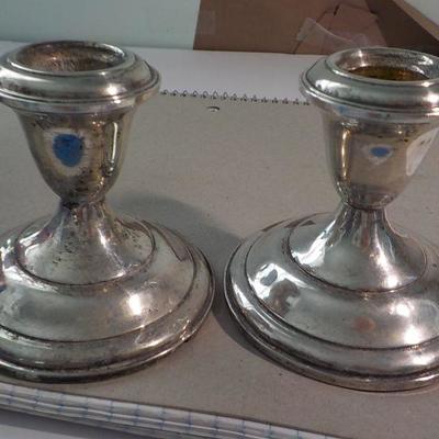 Sterling Candle holders.